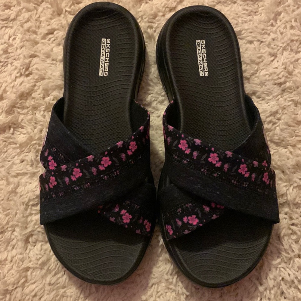 Skechers slip on shoes. Brand New. Worn one time. 10 Wide